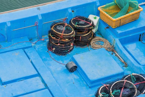 Crab traps on deck of fishing trawler in Yeosu, South Korea, Asia