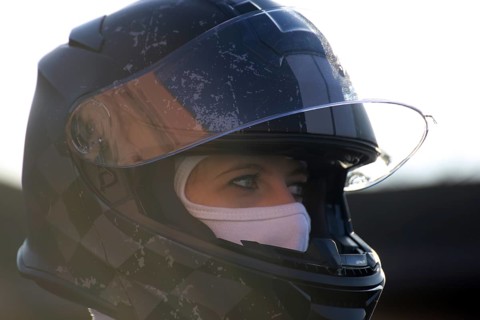 Racer with helmet and balaclava