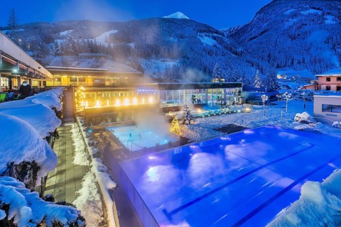 Snow-covered rock spa in winter, thermal bath at dusk, Bad Gastein, Gastein Valley, Hohe Tauern
