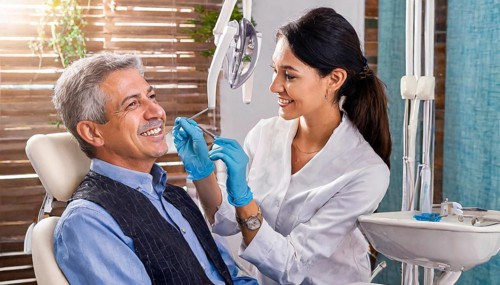 AI generated, dentist treats an attractive older man, senior, seniors, 65, dentist, blonde, 30, 35,