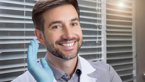 A friendly dentist in his practice, 35, portrait, attractive, attractive, friendly, friendly,