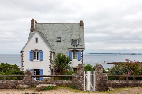 House by the sea, near Roscoff, Finistere, Brittany, France, Europe