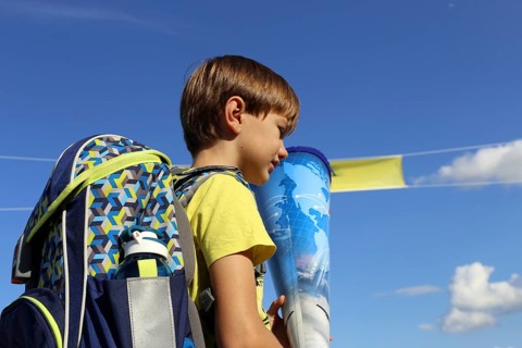Child on the way to his first day of school, (Mutterstadt, Rhineland-Palatinate)