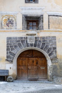 House entrance door, window, historic house, sgraffito, facade decorations, Ardez, Engadin,