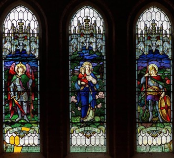 Stained glass window, Chute church, Wiltshire, England, UK Saints Michael, Mary and George