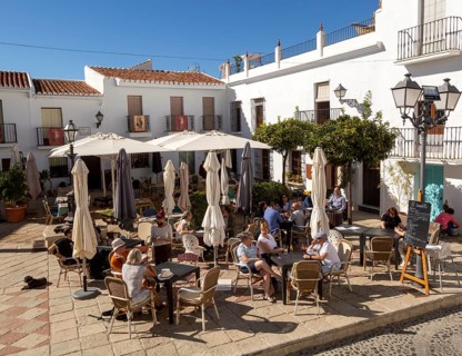 People and cafes in church square plaza, Plaza de la Iglesia, Frigiliana, Axarquia, Andalusia,