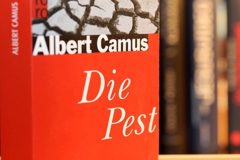 Close-up of the novel The Plague by Albert Camus