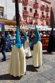 Semana Santa, procession with Nazarenos and tourists, celebrations in Cadiz, Spain, Europe