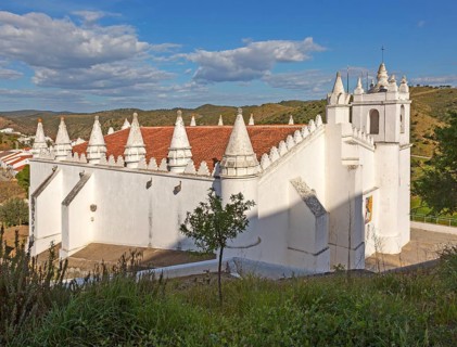 Architectural details of conical roof decorations historic whitewashed church Igreja Matrix in