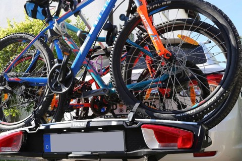 Mountain bikes on the rear carrier of a car