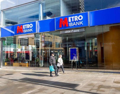 Signs on Metro Bank building, Regent Street, Swindon, Wiltshire, England, UK