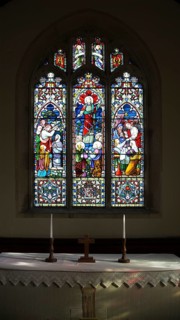 Raising of Lazarus, Ascension, Raising of daughter of Jairus depicted in stained glass window by
