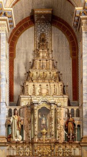 Ornately decorated altar inside the 17th century church of Igreja de Santiago, Tavira, Algarve,