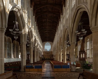 Interior of Holy Trinity Church, Long Melford, Suffolk, England, UK view down nave to east window