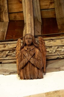 Church of All Saints, Great Glemham, Suffolk, England, UK carved wooden angel roof beam