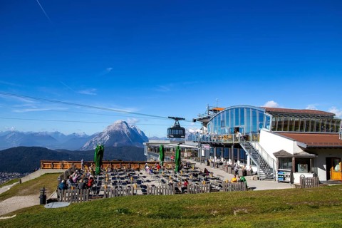 Rosshuette mountain station in Seefeld/Tyrol. Many tourists and locals take advantage of the sunny