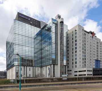 Modern architecture Premier Inn Cardiff City centre hotel building seen from Queen Street station,
