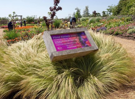 Royal Horticultural Society gardens at Hyde Hall, Essex, England, UK Floral Fantasia 2019 sign
