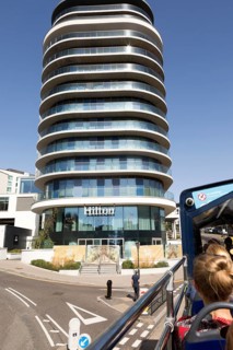 Modern architecture of Hilton Hotel, Bournemouth, Dorset, England, UK from top of passing