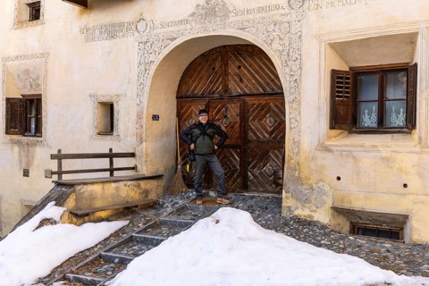House entrance door, window, historic house, sgraffito, facade decorations, Guarda, Engadin,