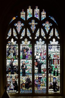 Stained glass window of saints, Bauchon chapel of Our Lady of Pity, Norwich Cathedral, Norfolk,