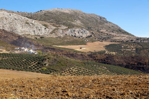 Small hamlet of Carrion, near Periana, Axarquia, Andalusia, Spain at base of limestone mountains