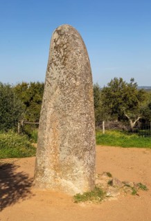 Neolithic standing stone 4 metres high called the Menir dos Almendres, near Evora, Alentejo,