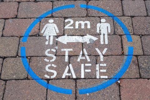 Covid-19 stay 2 metres apart social distancing pavement sign, Newbury, Berkshire, England, UK