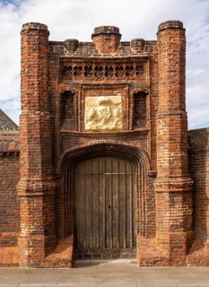 Red brick Tudor gateway Wolsey's Gate, Ipswich, Suffolk, England, UK, Cardinal Thomas Wolsey 1530s