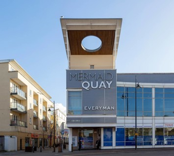 Leisure buildings and restaurants Cardiff Bay redevelopment at Mermaid Quay, Cardiff, South Wales,