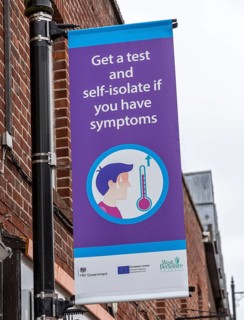 Get a test and self-isolate if you have symptoms Covid 19 information poster, Newbury, Berkshire,