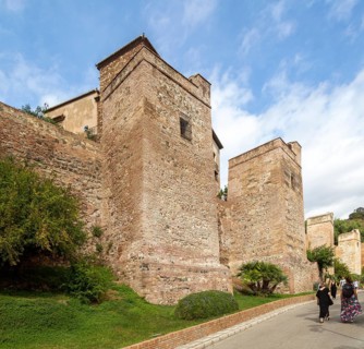 Historic walled defences to Moorish citadel fortress palace of the Alcazaba, Malaga, Andalusia,