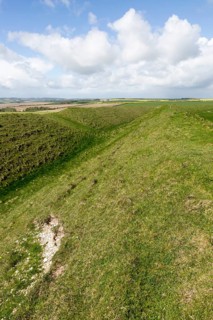 Defensive ramparts and ditch Yarnbury Castle, Iron Age hill fort, Wiltshire, England, UK