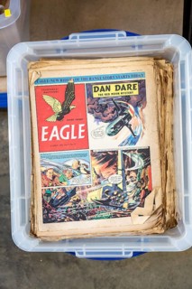 Vintage Eagle comics with Dan Dare cartoon story on display in house clearance auction sale room,