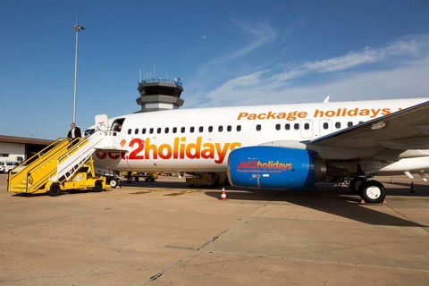 Jet2 package holiday plane passengers disembarking at the airport Faro, Algarve, Portugal, Europe