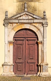 Doorway of Church Igreja Matriz de Nossa Senhora da Assuncaoin, village of Alvito, Beja District,