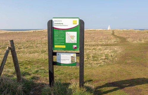 Sign for Lindisfarne National Nature Reserve, Holy Island, Northumberland, England, UK