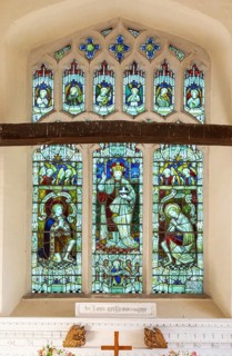 Stained glass east window Christ the King, Hacheston church, Suffolk, England, UK c 1919 war