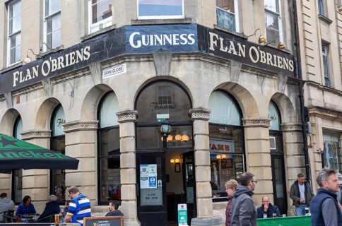 Flan O'Briens Irish pub Guinness advert, Bath, Somerset, England, UK