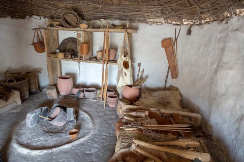 Re-creation of neolithic home, contents, weapons, tools, Stonehenge, Wiltshire, England, UK