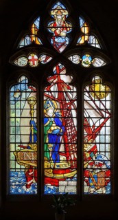 Stained glass window of Saint Nicholas standing in ship by Martin Travers 1927 Cricklade church,