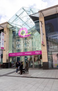 Entrance to Queens Arcade shopping centre, Queen Street, Cardiff, South Wales, UK