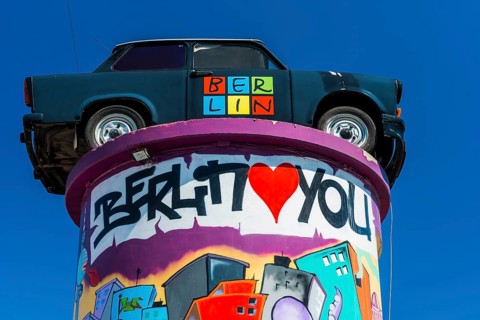 Trabant on an advertising pillar, sculpture, memory, monument, car, GDR, East Germany, colourful,