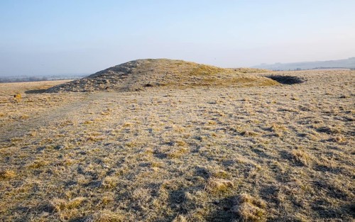 Bronze Age bowl barrow on Windmill Hill, a Neolithic causewayed enclosure, near Avebury, Wiltshire,