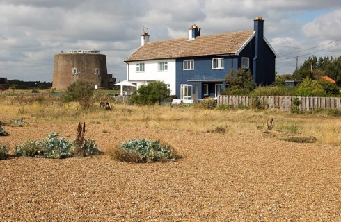 Beach house and historic Martello tower AA, Shingle Street, Suffolk, England, UK