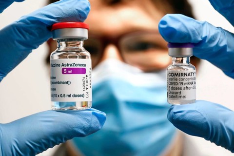 Vaccination vials with the Covid19 Biontech Pfizer vaccine Comirnaty and the Covid19 vaccine Astra