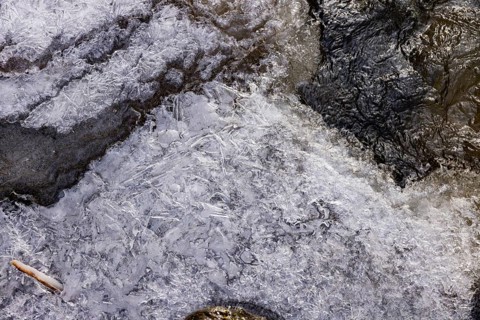 Severe frost has formed bizarre ice formations in the riverbed of the Gottleuba, Bergieshuebel,