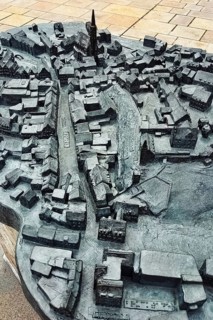 The historic city centre of Dingolfing with a view of the bronze city map. Dingolfing, Lower