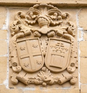 Stonework detail of coat of arms on wall of building, village of Elceigo, Alava, Basque Country,