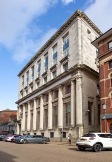 Large nineteenth century buildings, Butetown, Cardiff Bay, South Wales, UK, Portland House built